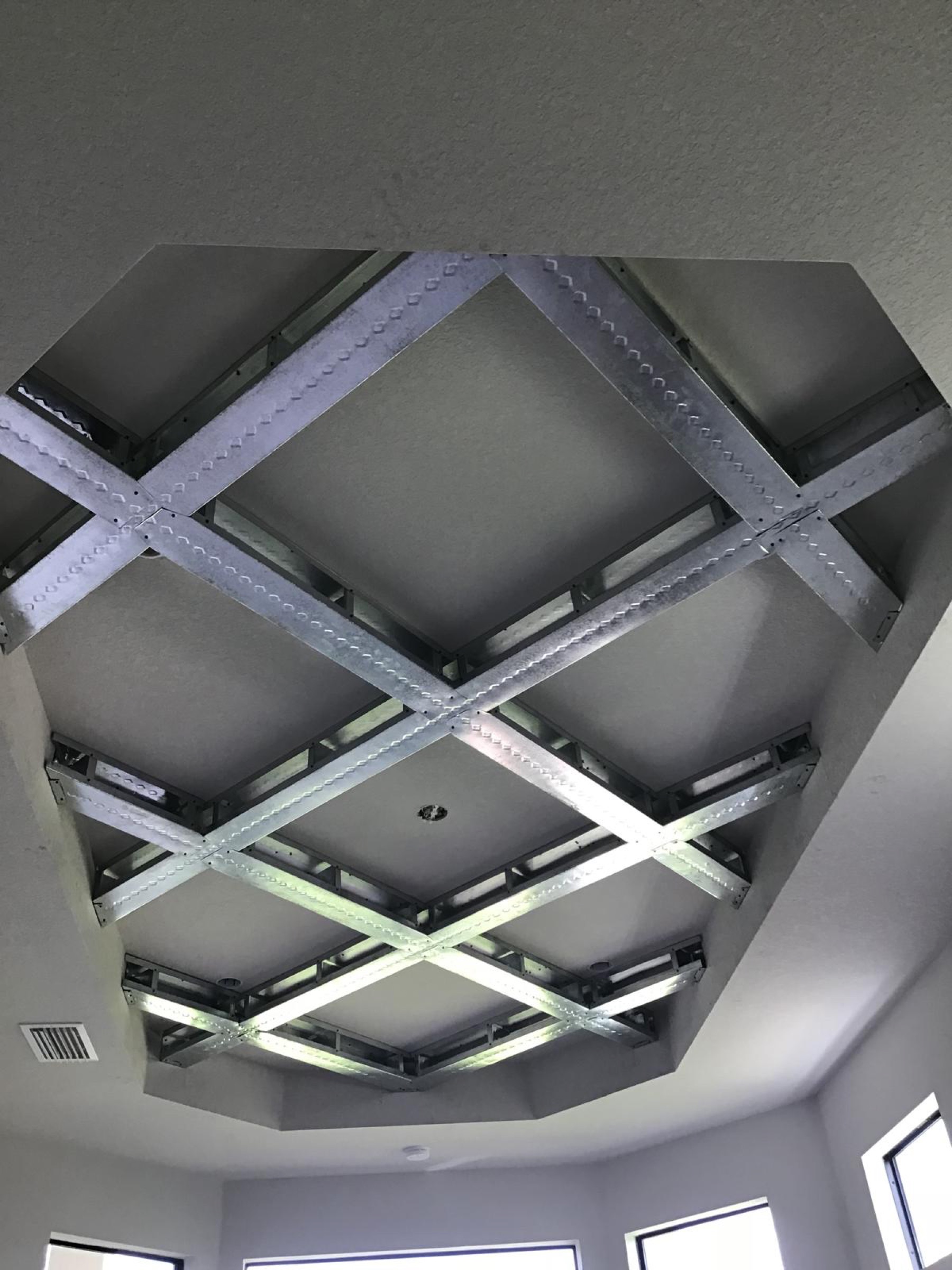 Diamond pattern coffered ceiling.